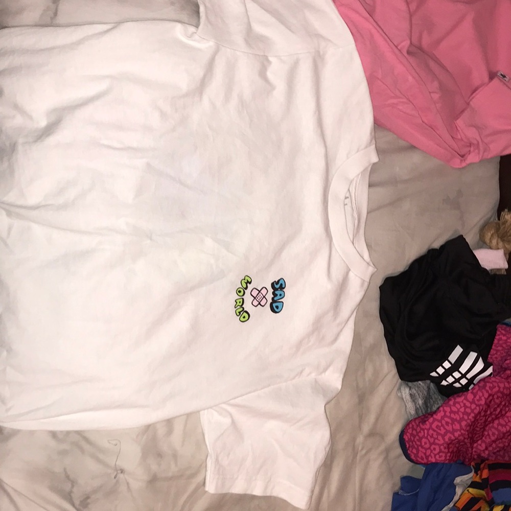 Size: Medium White Tee-shirt/ Sad Sad World